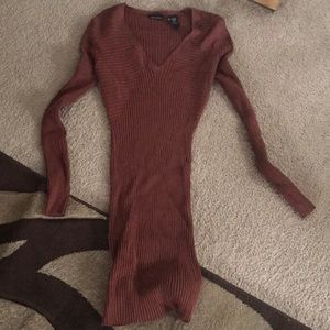 Sexy and sleek body hugging sweater dress